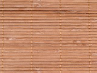 Natural woven wood blinds enhancing the ambiance of a sunlit room.